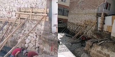 Yıkılan 3 katlı binayı tahtalarla tutmaya çalışmışlar